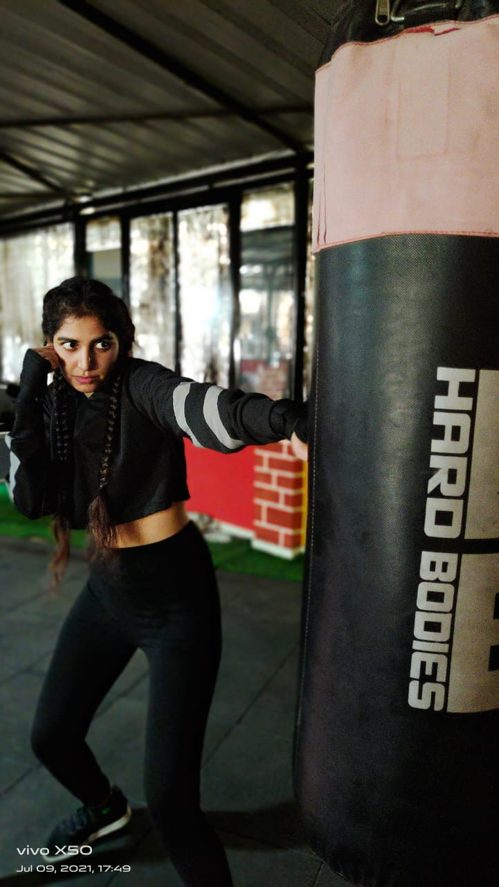 Boxing Warriors athlete working the heavy bag
